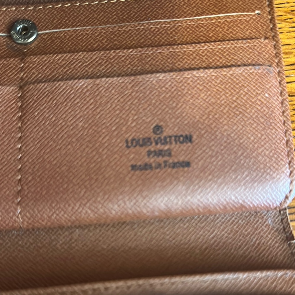 Louis Vuitton Brown Leather Wallet with Luxurious Craftsmanship